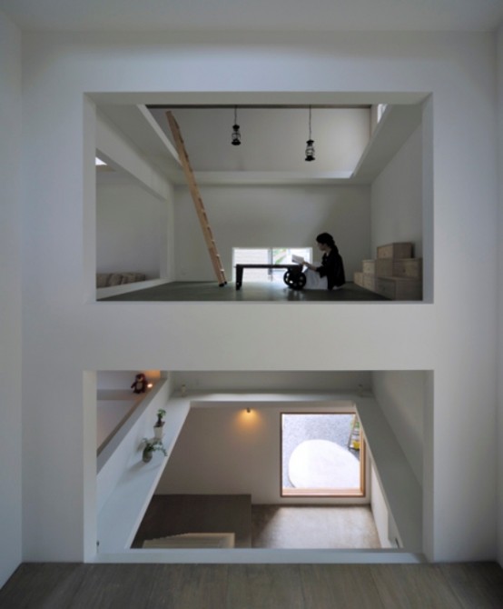 Ultra Minimalist House With Ladders Connecting Strories