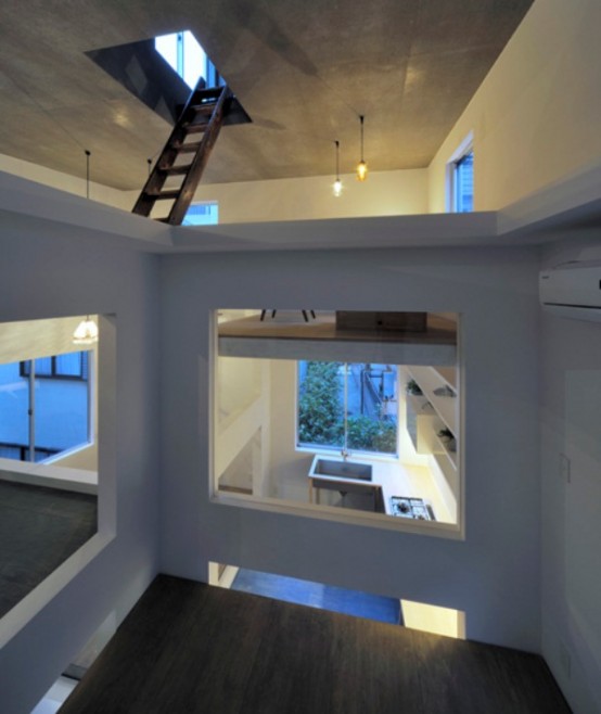 Ultra Minimalist House With Ladders Connecting Strories