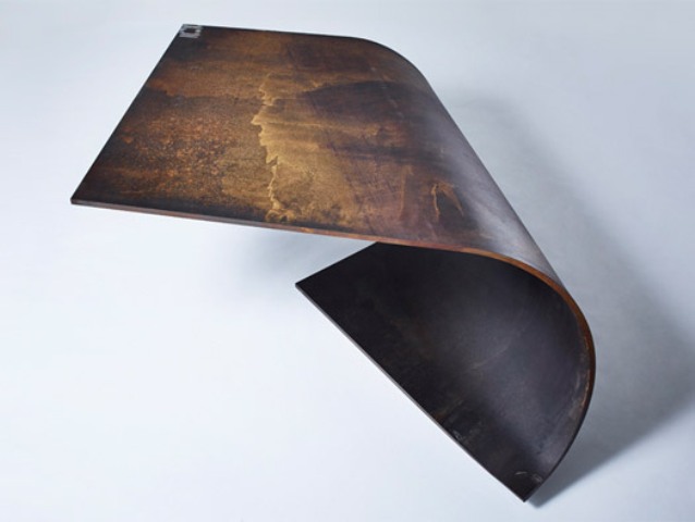 Unique Balanced Poised Table Of Rolled Steel