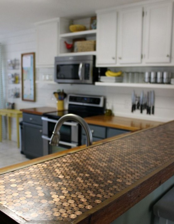 a penny countertop looks bold, cool and can be DIYed of coins and epoxy by you yourself