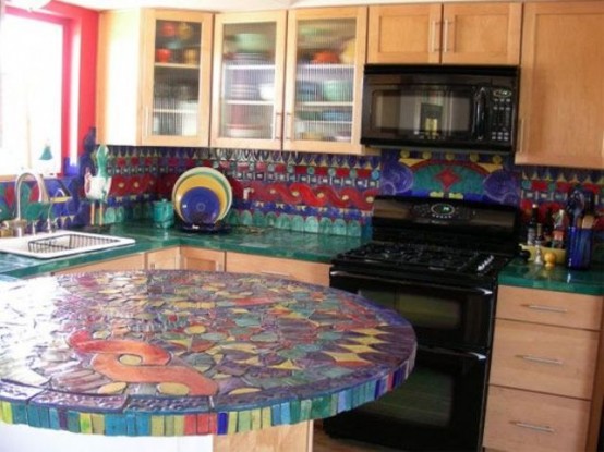 a colorful mosaic countertop adds brightness to the space and spruces up neutral wooden cabinets