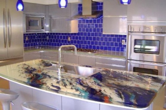 a colorful epoxy countertop that matches bright colors of the backsplash and features even more shades with watercolors