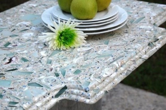 a mosaic countertop in grey and aqua-colored glass is a stylish and bright idea for home decor