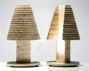 a modern wooden table lamp shaped as a mushroom or a tree will bring a natural feel to your room