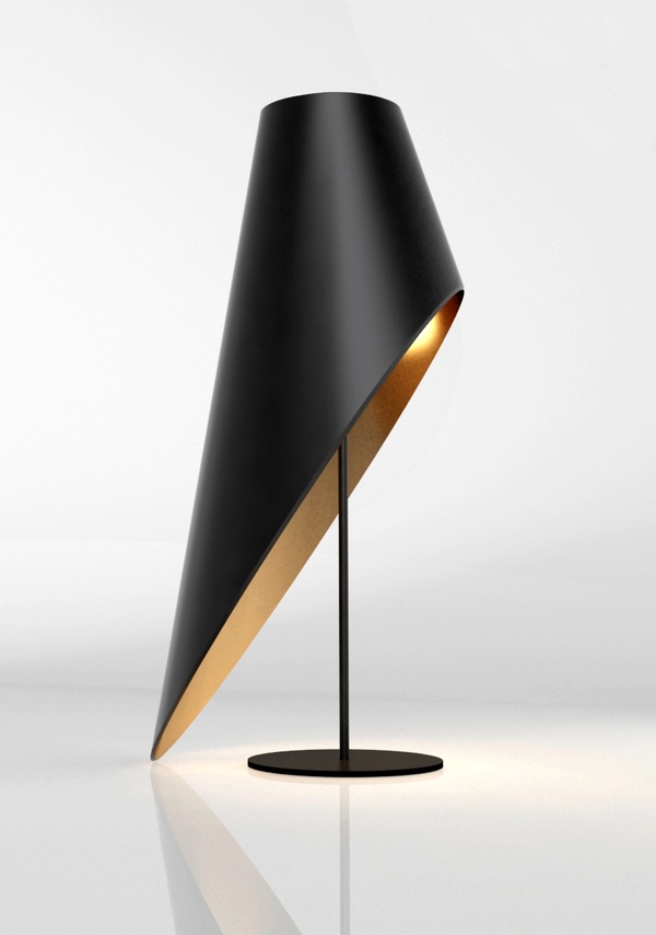 a gorgeous black and gold asymmetrical table lamp with a cut lampshade is a bold refined statement for a modern space