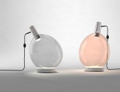 unique balloon-inspired table lamps in grey and blush are lovely and chic and will complete a modern space