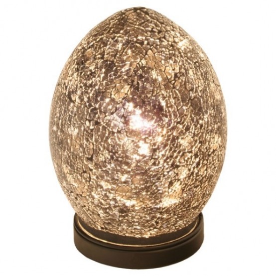 a unique egg-like table lamp reminds of the drago eggs from the famous GOTH