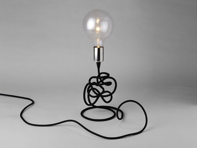a stylish modern bulb table lamp with black cord is a cool idea for a contemporary space