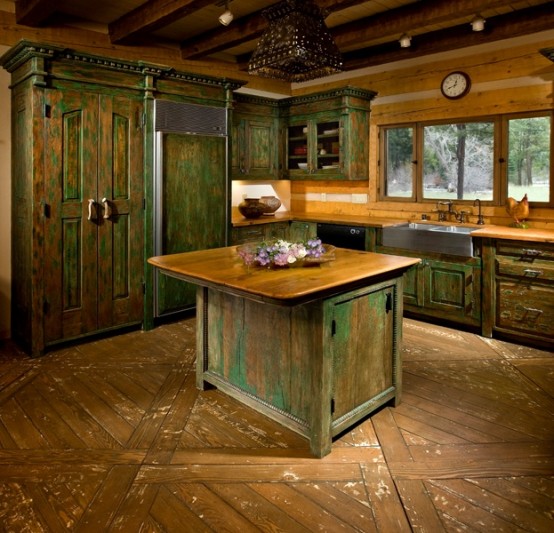 a shabby chic kitchen island with a plywood countertop matches the rest of the kitchen and looks unusual