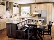 an oversized dark stained L-shaped kitchen island with a built-in bench and white countertops will save much space and give you everything you need