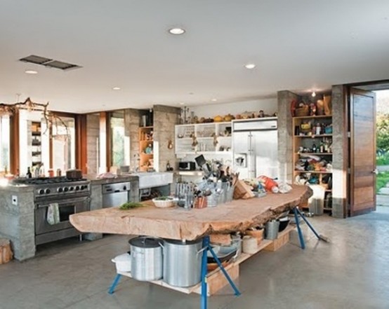 a unique kitchen island with bright blue legs and a living edge wodoen countertop is a very trendy idea to try