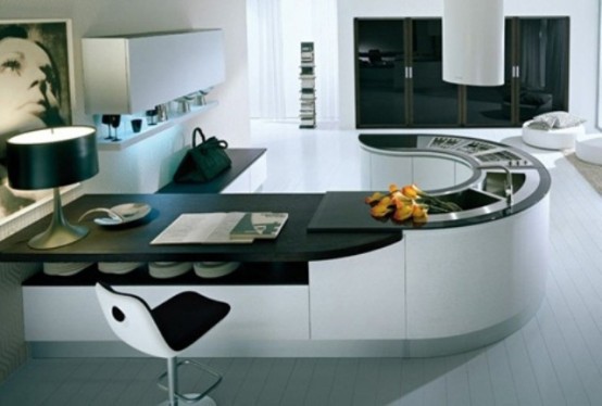 a minimalist oversized kitchen island in white and black separates the kitchen from the rest of the house