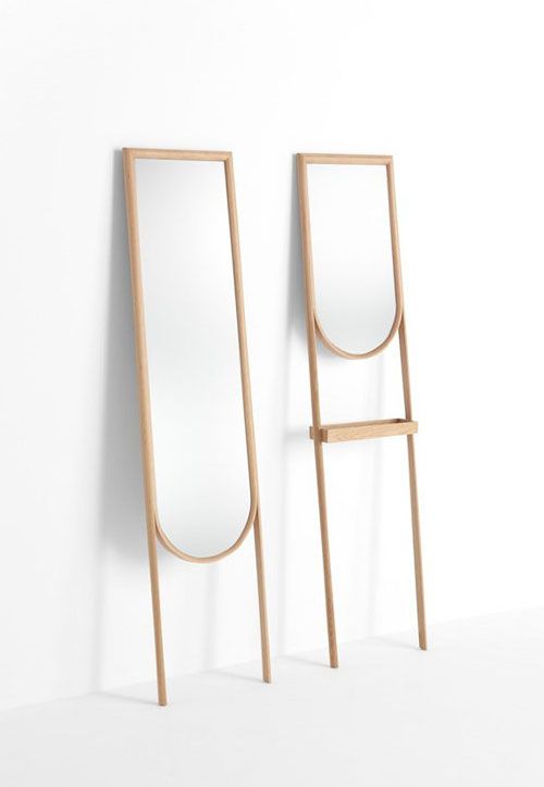 such airy and catchily shaped mirrors with shelves and on legs will be a great solution for a small space, whether it's a bathroom, bedroom or entryway