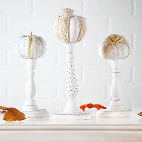 white stands with neutral fabric pumpkins are ideal for Thanksgiving, make some yourself