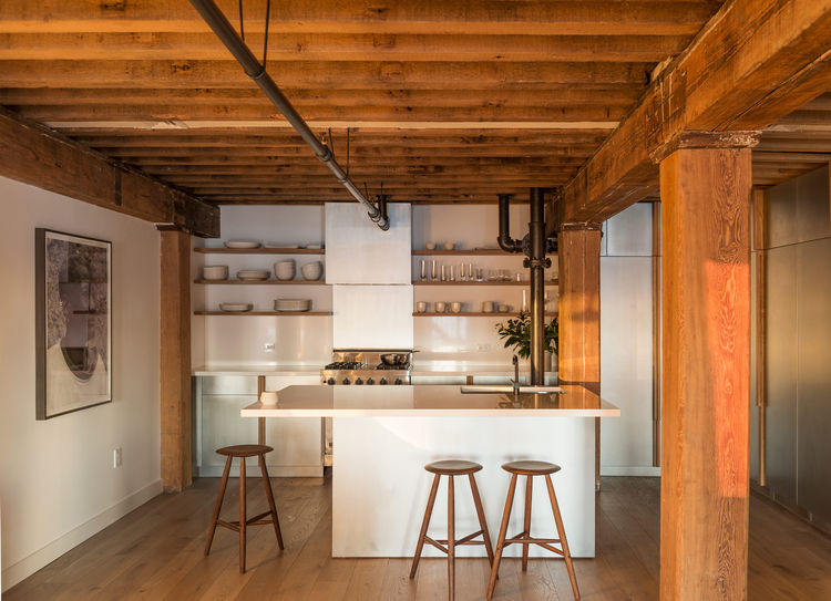 Picture Of warm manhattan home with an extensive wood use  1