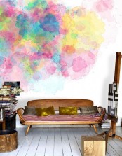 a charming living room with a watercolor wall art right on a wall