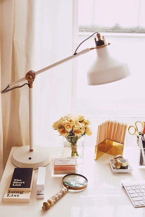 go for a white and gold IKEA Ranarp lamp for your work space, it will bring enough light for work and will add elegance to the space