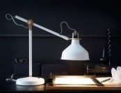a white IKEA Ranap lamp illuminates and lights up a moody home work space and makes it more welcoming