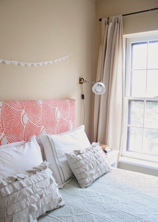 a chic bedroom with girlish touches and IKEA Ranarp sconces on the wall is a very cozy idea