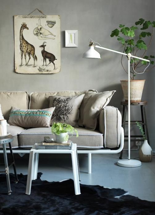 a white floor Ranarp lamp is a perfect fit for many spaces, here it's integrated into a contemporary living room