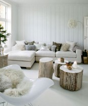 a variety of fluffy pillows make the living room very cozy and holiday-like