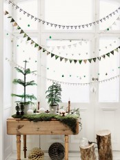 moss and Christmas trees, tree stumps as side tables are amazing for natural winter decor