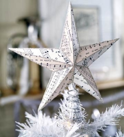a note paper star tree topper is a lovely solution for a whimsical Christmas tree and it will show off your love to music at once
