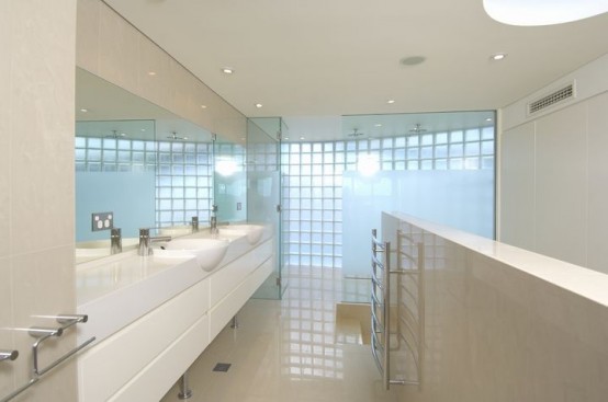 white bathroom seafront house