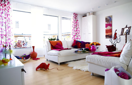White Living Room With Pink And Orange Accents