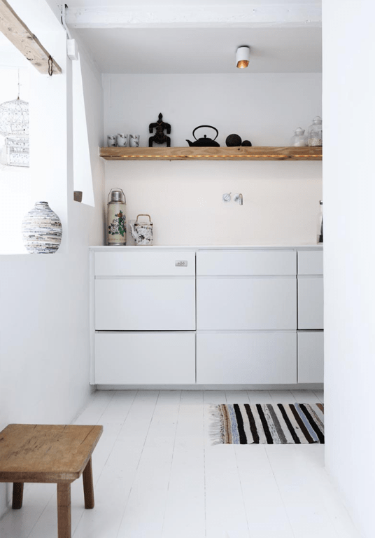 White Minimalist House With Indian Accessories