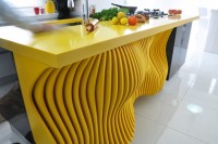 white-minimalist-kitchen-with-a-sculptural-yellow-island-6