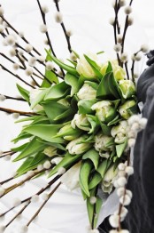 a white tulip and willow arrangement is a great spring centerpiece or just home decoration to rock