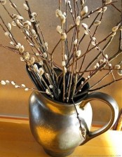 a vintage jug with willow is a cool rustic and vintage decoration for spring