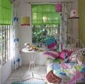 bold curtains, bright bedding, colorful lampshades refresh the space and make it cheerful and fun