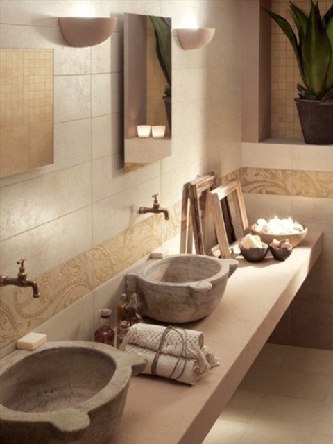 stone bowl-like sinks are amazing to add a natural touch to the space and they look very chic