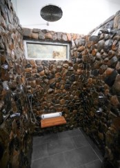 a gorgeous shower space all clad with natural stone will make you feel as if you are having a shower somewhere outdoors