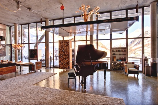 Wood And Concrete Chalet In The Swiss Alps